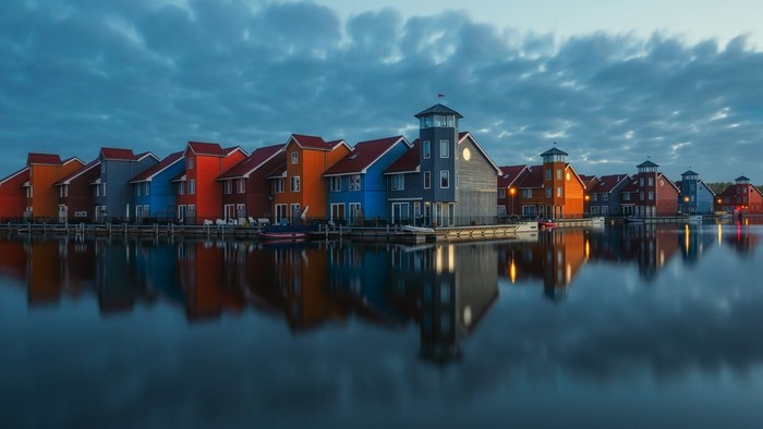 Colorful houses on the water in Groningen, Netherlands