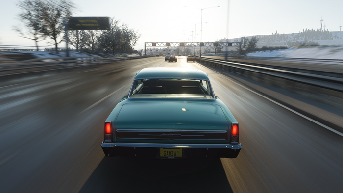 Car driving on a highway in Forza Horizon 4