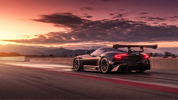 Aston Martin Vulcan on a race track at sunset