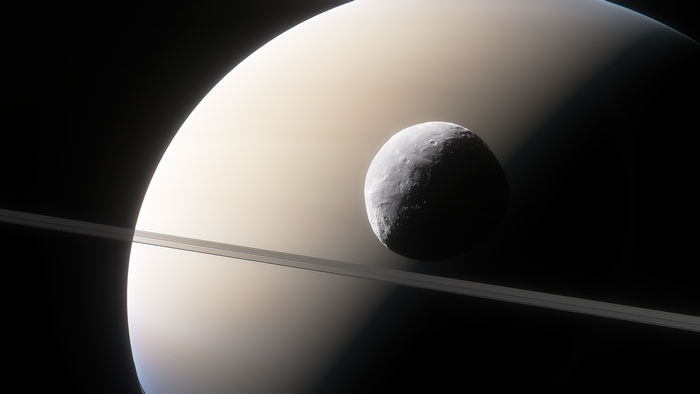 Moon orbiting Saturn with rings
