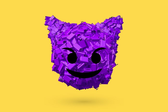 Purple suitcase devil emoji on yellow background