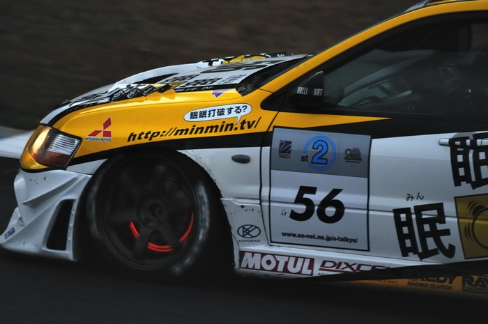 4K Mitsubishi Lancer Evolution VIII race car with numbers 56