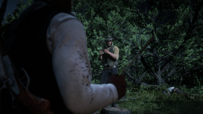 Man in hat confronts another man in Red Dead Redemption 2