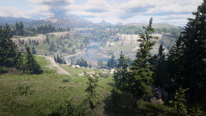 Red Dead Redemption 2 landscape with river and train bridge
