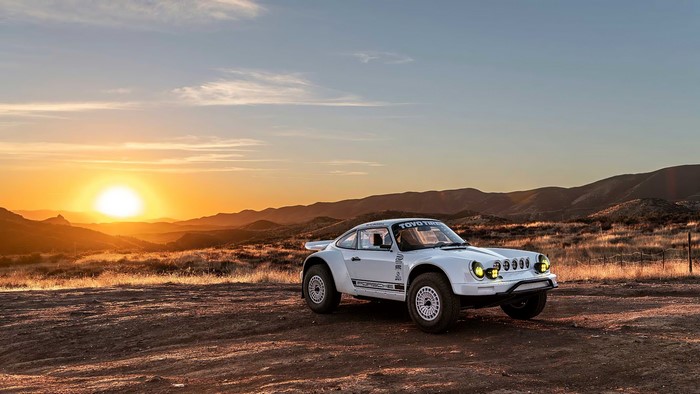 White Porsche 911 Rally Car in Desert at Sunset