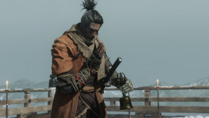 Sekiro: Shadows Die Twice character holding a bell