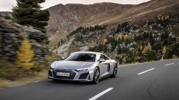 Audi R8 V10 driving on a mountain road