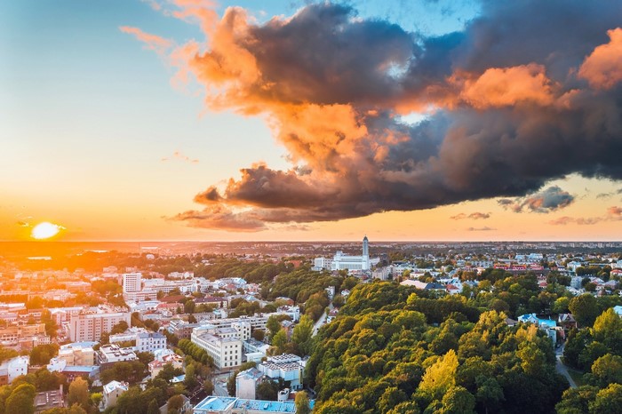 Kaunas cityscape at sunset with dramatic clouds