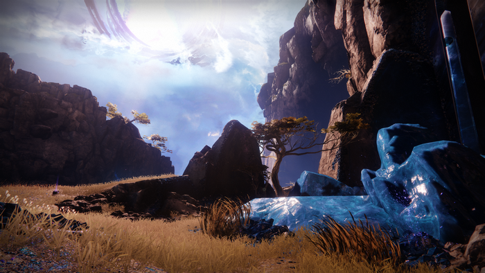 Destiny 2 landscape with rocky cliffs and glowing crystals
