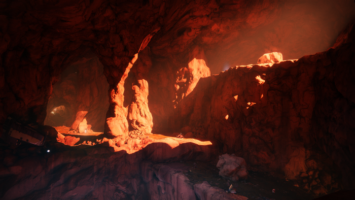 Cave interior with red lighting in Destiny 2