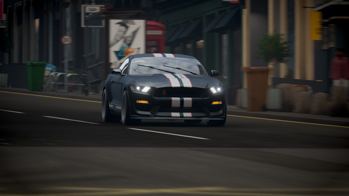 Ford Shelby GT500 driving on a city street