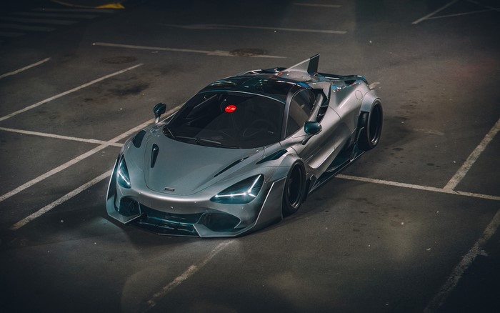 Silver McLaren 720S Stanced Supercar at Night