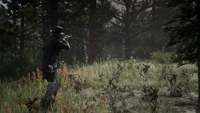 John Marston aiming a gun in Red Dead Redemption 2