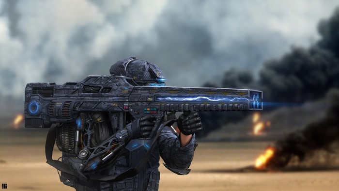 Soldier with futuristic weapon in desert