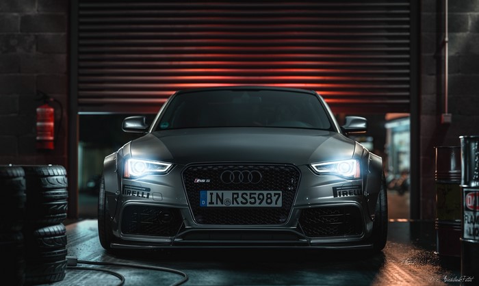 Audi RS5 in a garage with Pirelli tires
