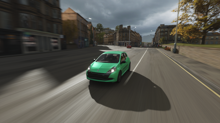 Green car driving on a street in Forza Horizon 4