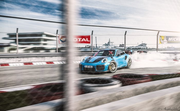 Blue Porsche 911 GT2 RS Drifting on Race Track