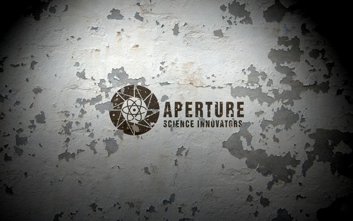 Aperture Science Innovators logo on a textured wall