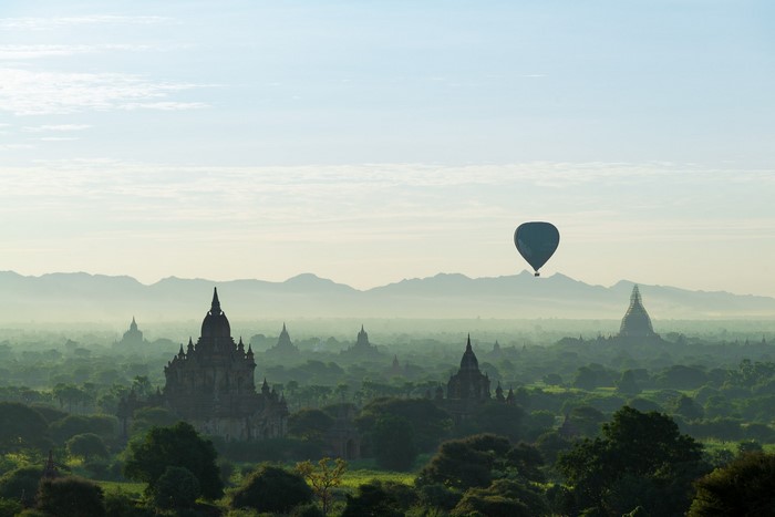 Hot air balloon over ancient temples in Bagan, Myanmar