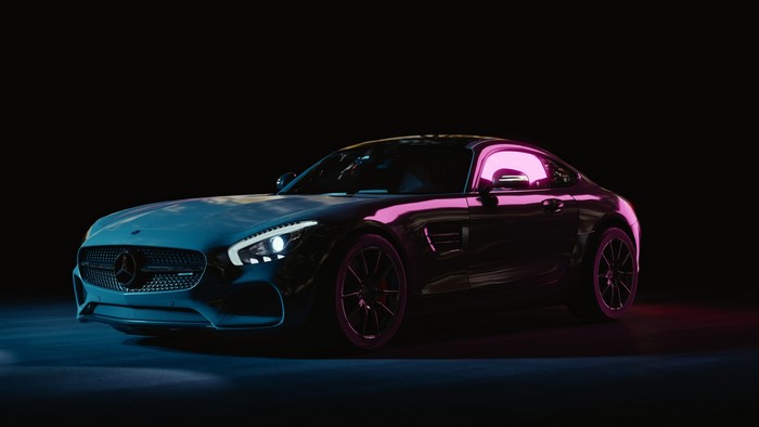 Mercedes Benz car with violet and light blue lighting