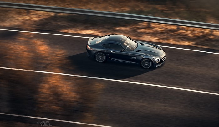 Mercedes-Benz AMG GT S driving on a road