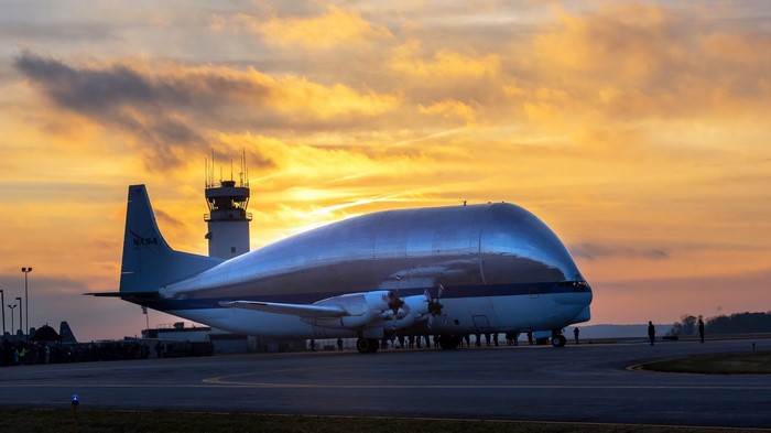 NASA Super Guppy aircraft at sunrise