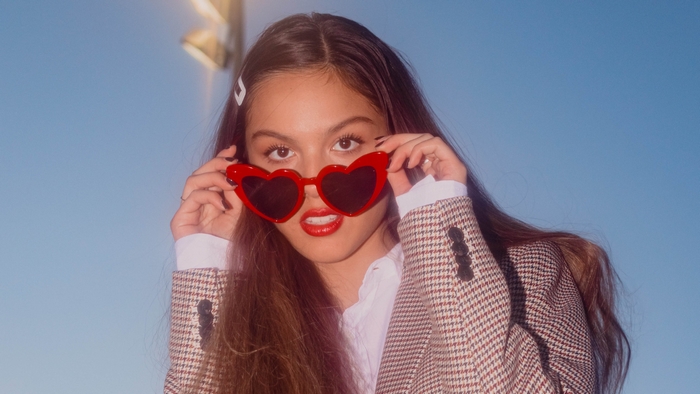 Olivia Rodrigo wearing heart-shaped sunglasses