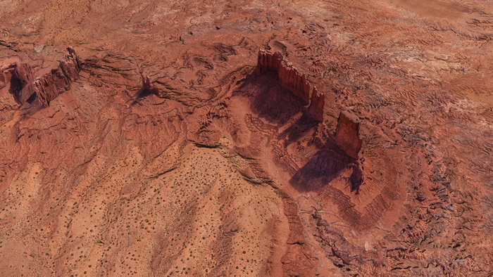 4K Aerial View of Rugged Desert Landscape