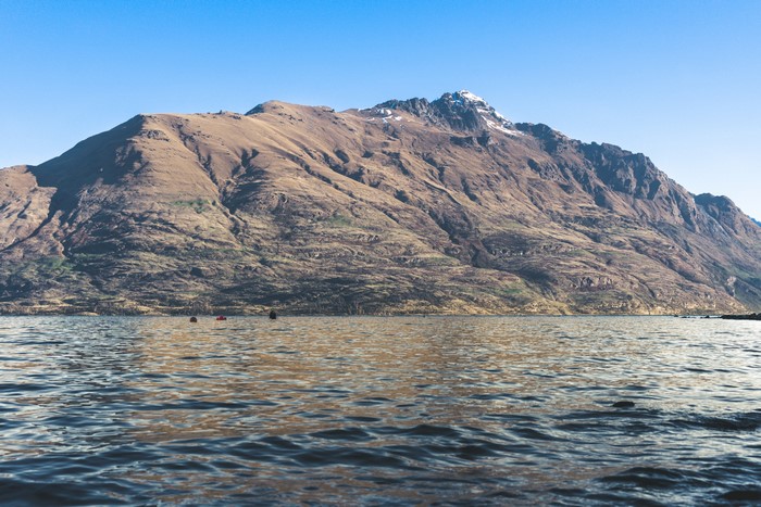 4K Snow on Mountains over Lake in Queenstown, New Zealand