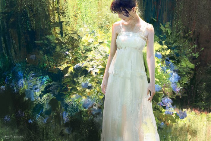 Woman in white dress standing in a garden