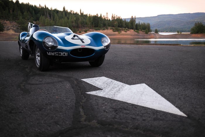 Blue Jaguar D-Type race car with number 4