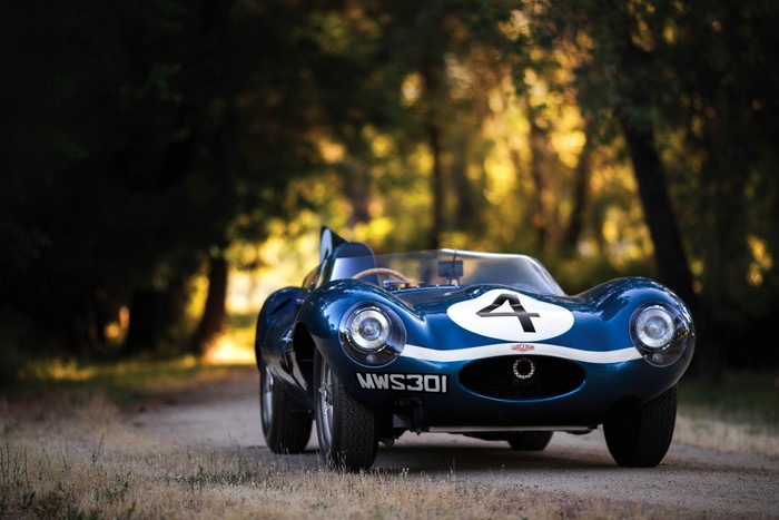 Blue Jaguar D-Type race car with number 4