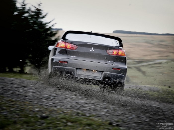 Mitsubishi Lancer Evo X Rally Car Driving on Dirt Road