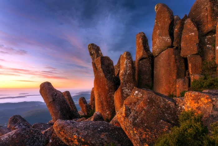 Rock formations at sunset with colorful sky