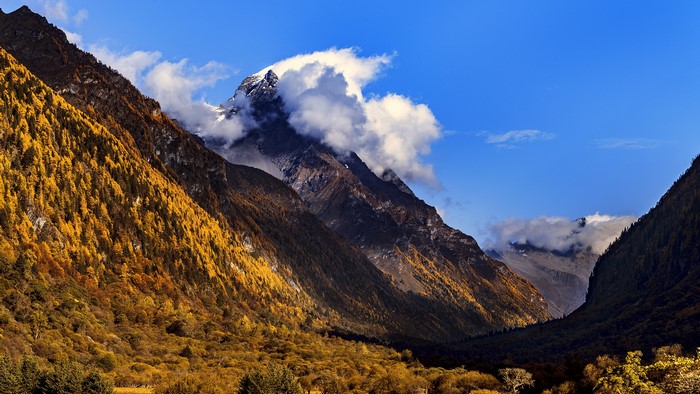 Autumn mountains in Sichuan with clouds