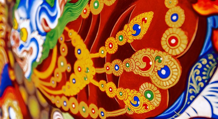 Colorful Buddhist mural detail