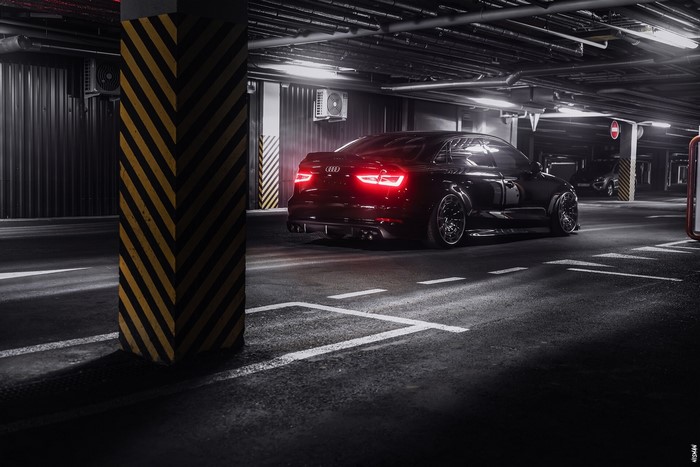Black Audi A3 Quattro in parking garage