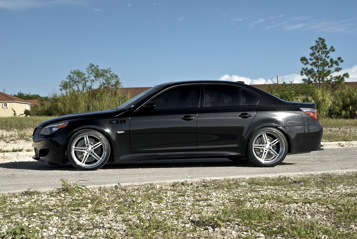 Black BMW M5 E60 on a road