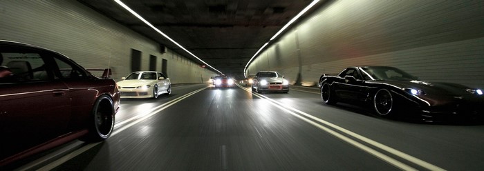 Nissan Skyline GT-R R34, Nissan Silvia S14, and Chevrolet Corvette in tunnel