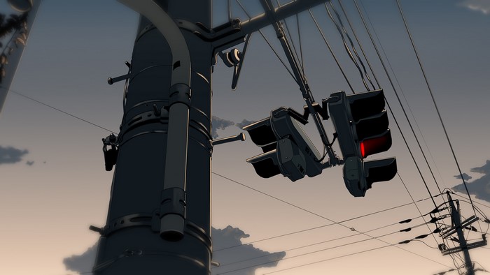 Traffic lights and power lines against sky