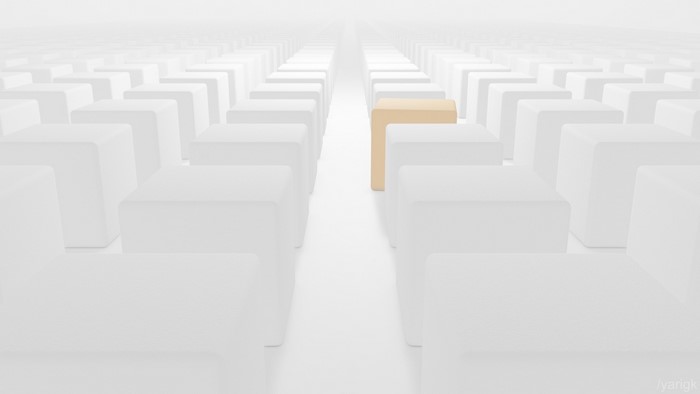 Abstract 3D render of rows of white cubes with one gold cube
