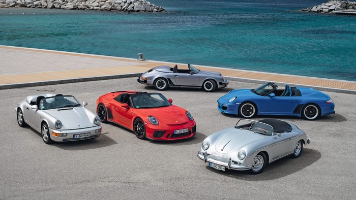 Group of Porsche convertible cars by the sea