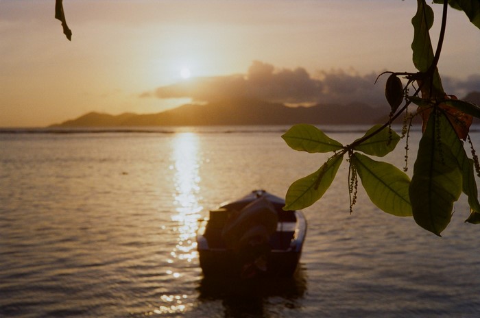 Boat on the water during golden hour sunset