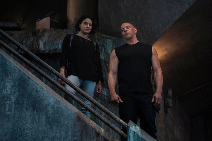 Letty Ortiz and Dominic Toretto on stairs