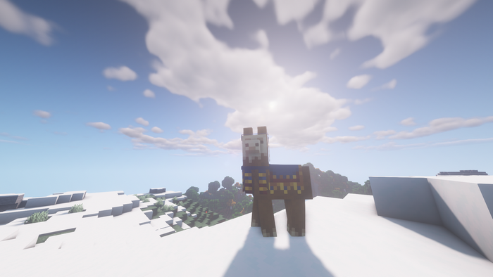 Llama in a snowy Minecraft landscape