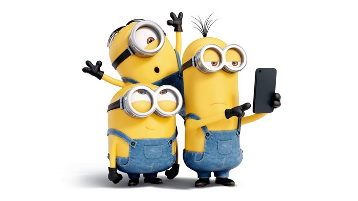 Minions taking a selfie with a phone