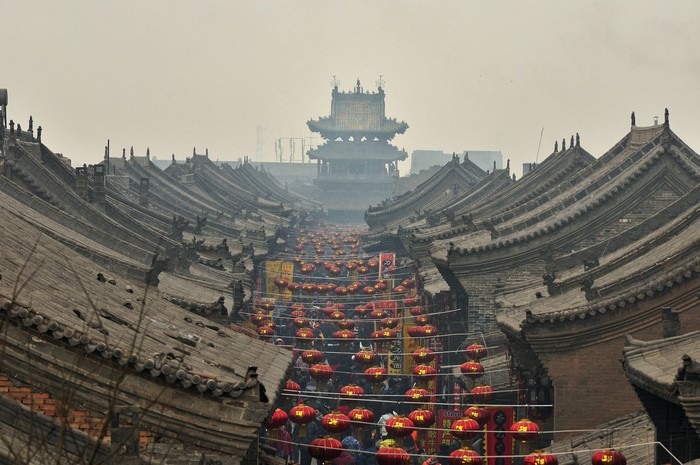 Street lined with traditional Chinese architecture and lanterns