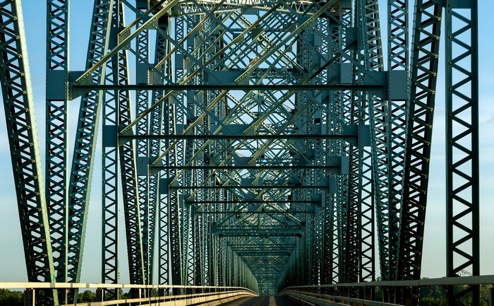 Steel truss bridge over a river in the USA