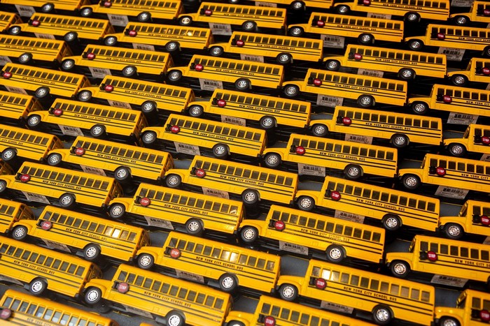 Rows of yellow toy school buses