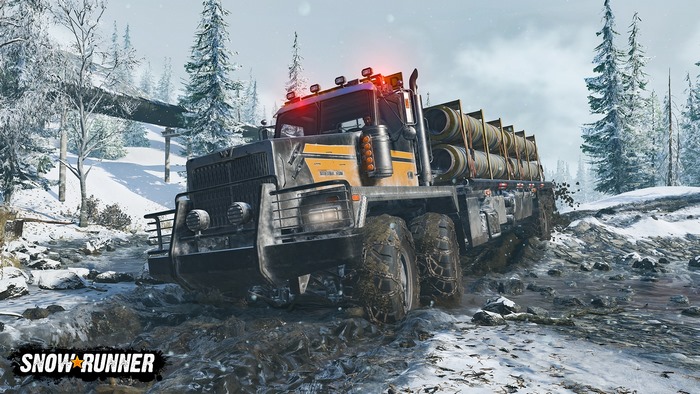 SnowRunner truck driving through a snowy landscape